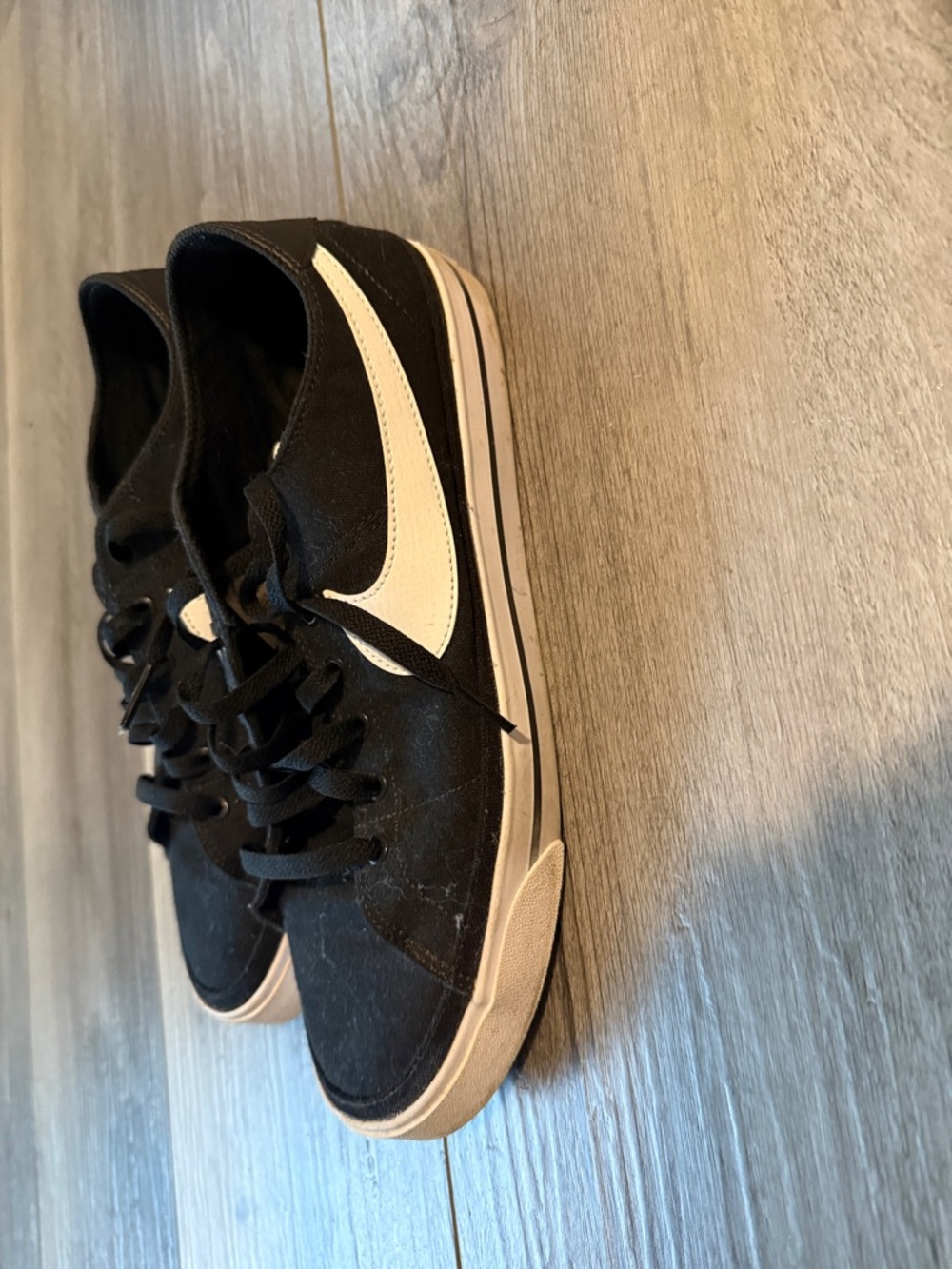 Nike Black Low-Top Canvas Sneakers with white Swoosh